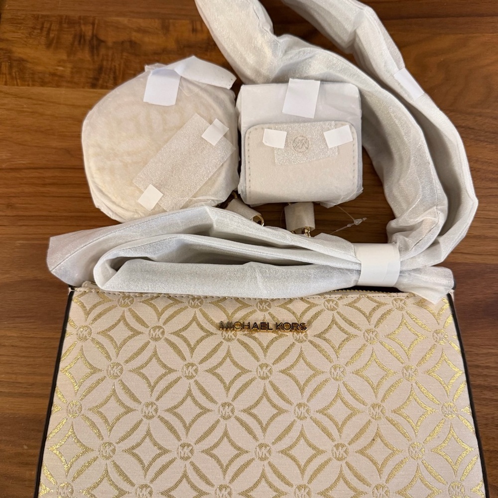Michael Kors Gold and Cream Jet Set Travel Crossbody with Tech Attachments - Picture 3 of 4